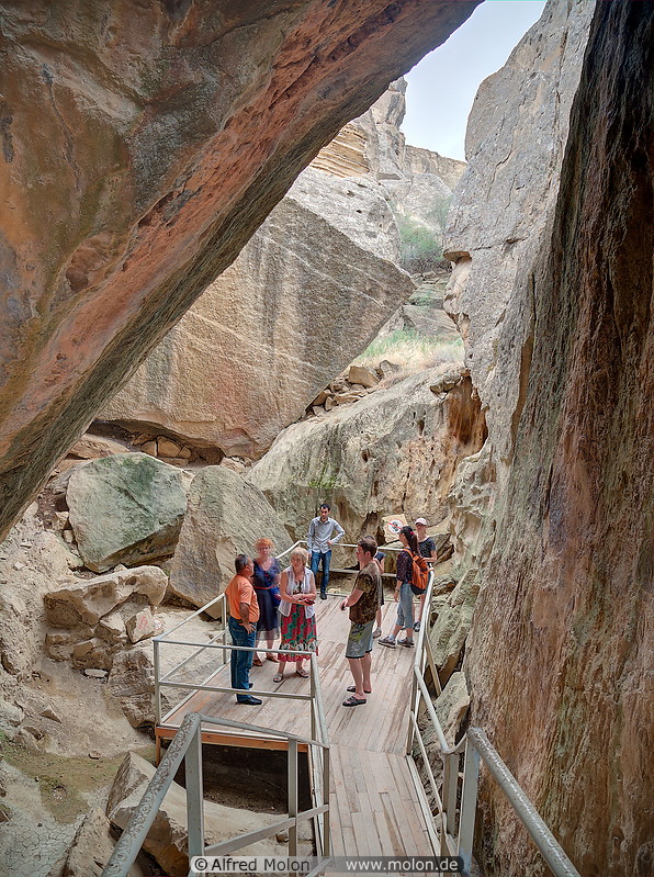 15 Tourists among limestone boulders