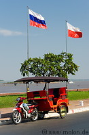 16 Motorcycle rickshaw and flags