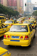 10 Yellow taxis on street