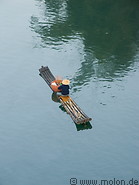 02 Fisherman on bamboo boat
