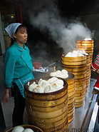 17 Lady selling steamed dumplings
