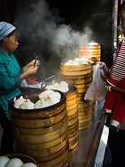 18 Lady selling steamed dumplings