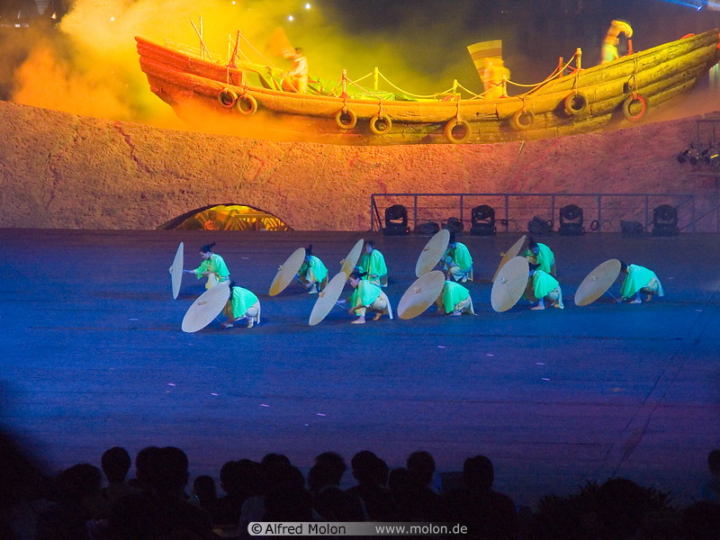 16 Female dancers on stage and boat