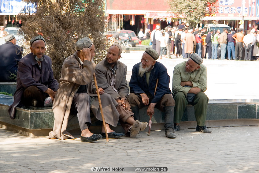 17 Old Uighur men sitting and talking