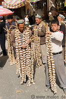 16 Men selling garlic