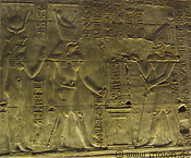 18 Bas-relief with the goddess Hathor, the god Horus and a pharaoh