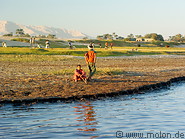 15 Nile river bank with children