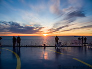 16 People on the outer deck at sunset