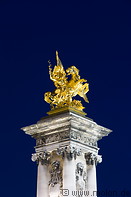 17 Gilded statue on column
