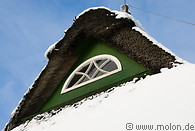26 Snowy thatched roof