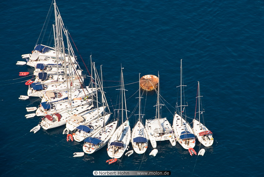 16 Sailing yachts at pier