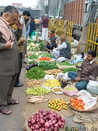 11 Vegetable sellers and buyers