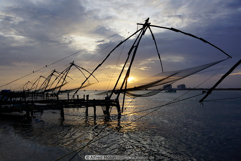 13 Chinese fishing nets at sunset