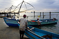 08 Fishermen and boats on beach