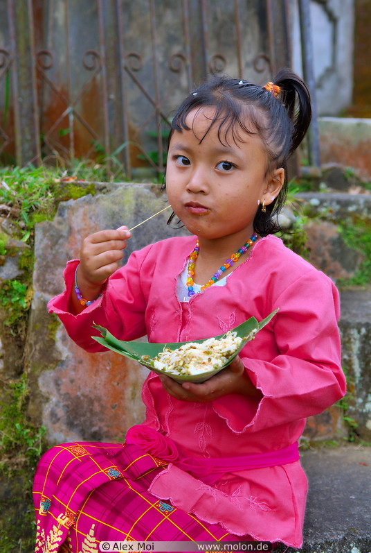 11 Balinese girl eating
