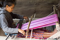 13 Woman weaving cloth