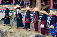 13 Women in traditional dress walking in