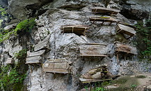 35 Coffins hanging from rock face