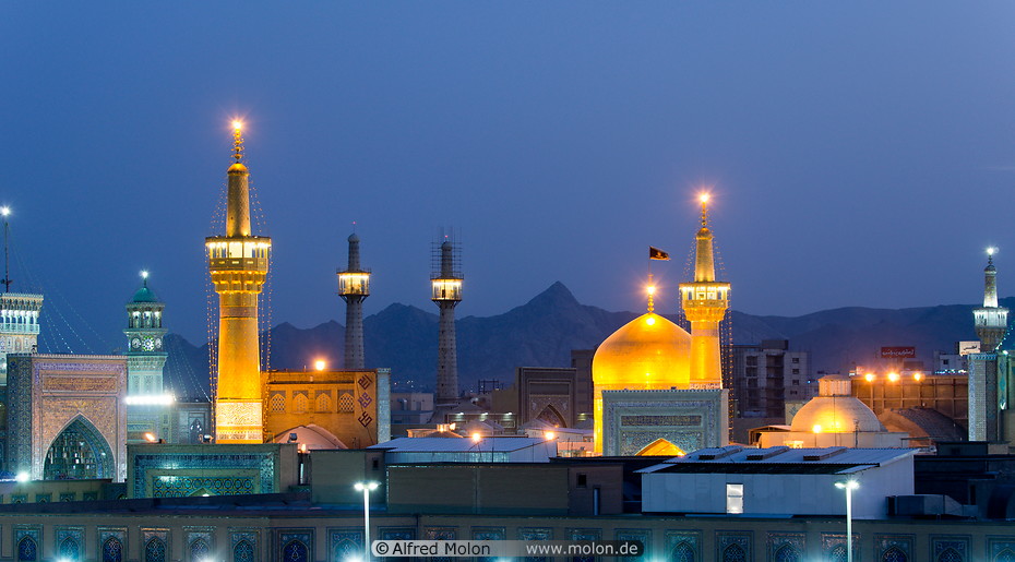 19 Golden dome and minarets at night