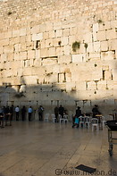 12 Jews praying along wall
