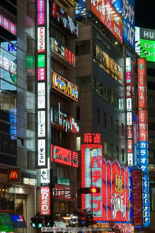 06 Storefronts illuminated with neon lights