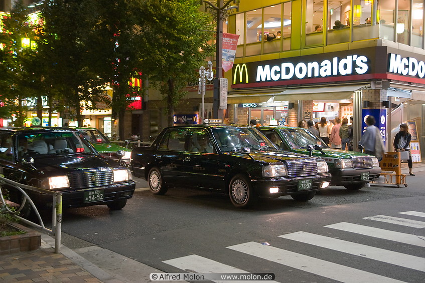 13 Taxis stopping in front of McDonalds