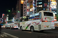 16 White buses on street