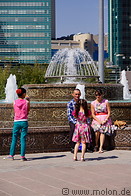 06 Family sitting at fountain