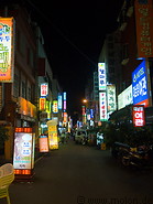 11 Alley with shops and neon lights