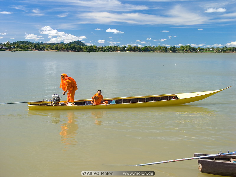 14 Buddhist monks on boat