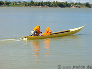 15 Buddhist monks on boat
