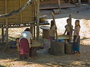 02 Villagers crushing rice