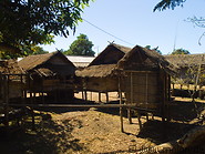 03 Wooden houses with leaves roofs