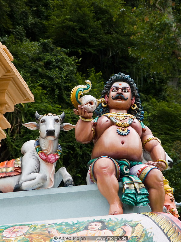 03 Roof detail with cow and Hindu god statues