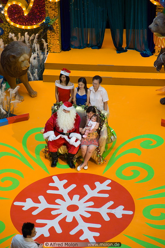 08 Family posing with Father Christmas