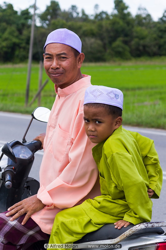 07 Malay father and son on motorbike