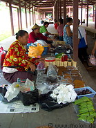 11 Ladies selling tobacco leaves