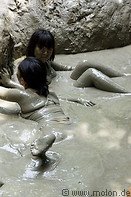 06 Tourists bathing in mud volcano