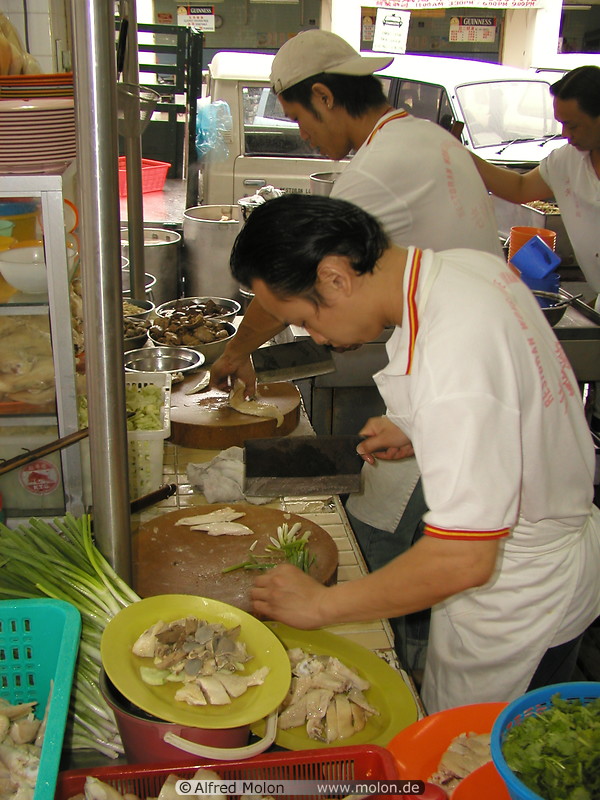 01 Cooks preparing chicken rice