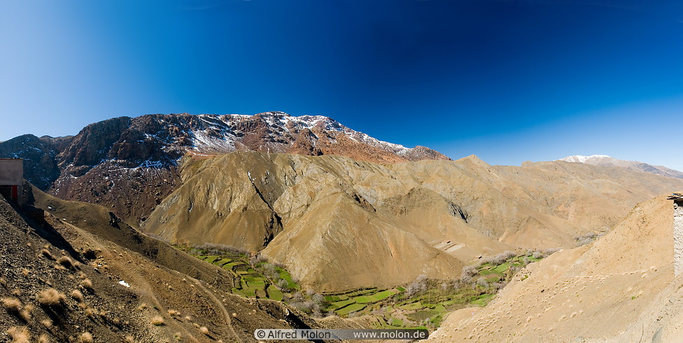14 Valley with irrigated terraced fields and snow capped peaks