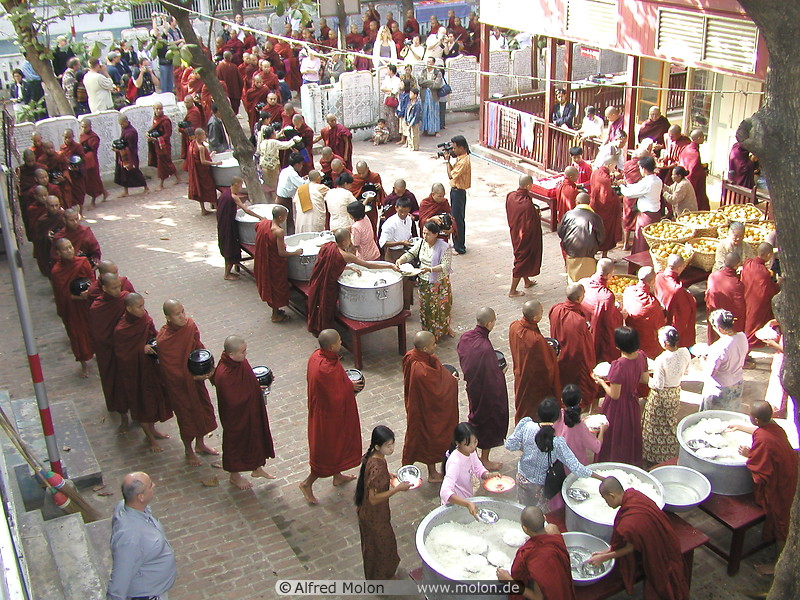 10 Monks queuing up for lunch