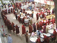 10 Monks queuing up for lunch