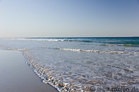 37 Waves breaking on sandy beach
