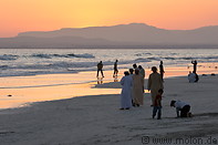 21 People on beach at sunset