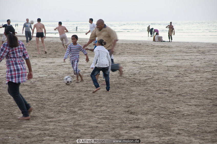 10 Playing beach football