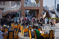 08 Restaurant tables and tourists on bicycles