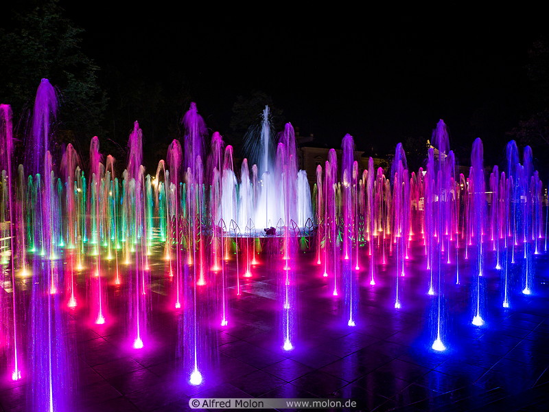 15 Colourful light fountain at night