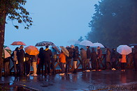 16 Tourists waiting for the sunrise in the rain