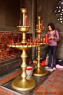 04 Woman lighting a candle