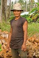 04 Worker in a coconut palm plantation on Koh Mak